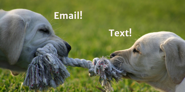 Two puppies tugging on a rope, with the words Email and Text above them.