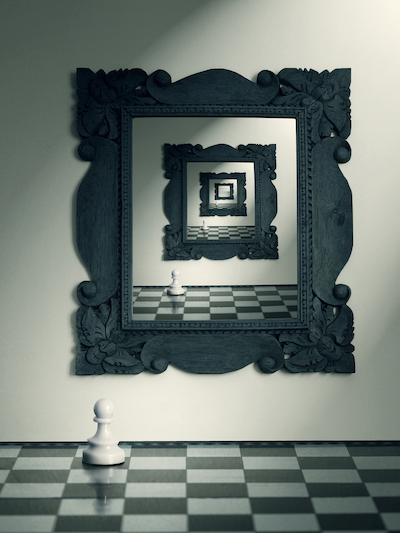 Mirror on the wall and pawn chess and their repeated reflection in the mirror