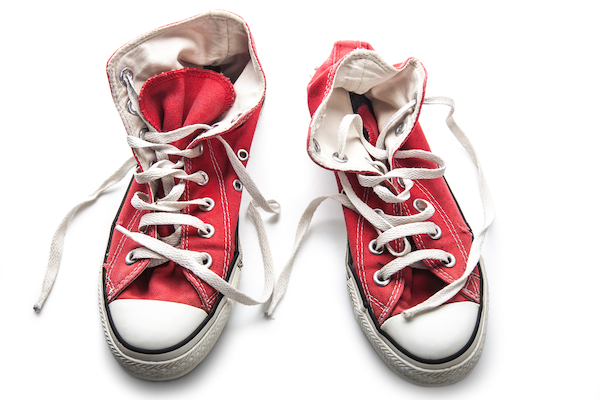 red high top sneakers on a white background