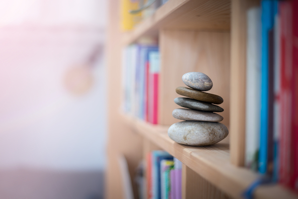 stone cairn on a bookshelf