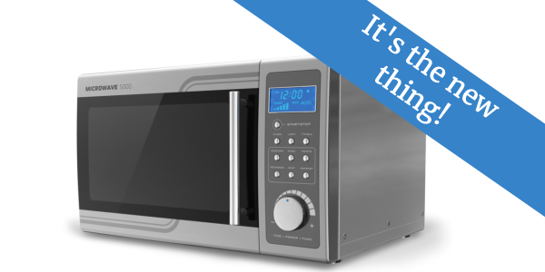 Photo of microwave, with text "It's thew new thing!"