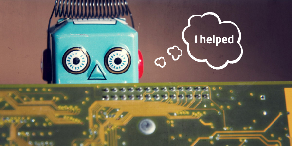 toy robot hiding behind circuit board, with thought circle saying "I helped"